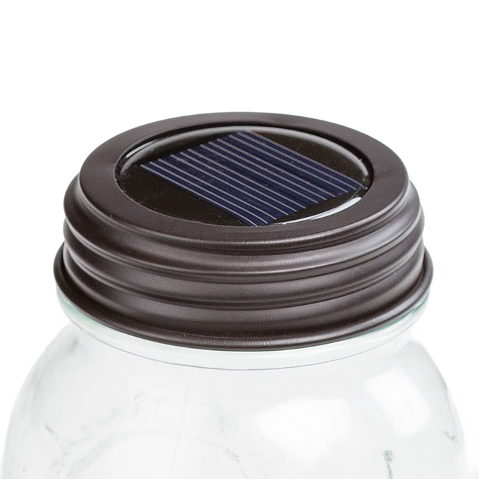 Rustic brown solar jar lid with integrated solar panel designed to fit standard mason jars, providing eco-friendly lighting for Home & Decor, Best Sellers, and Promo Eligible collections.