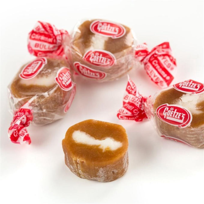 Individually wrapped creamy caramel candies with a soft white cream center, handcrafted in the USA, perfect for Kitchen & Food, Snacks and Sweets, and Best Sellers collections.