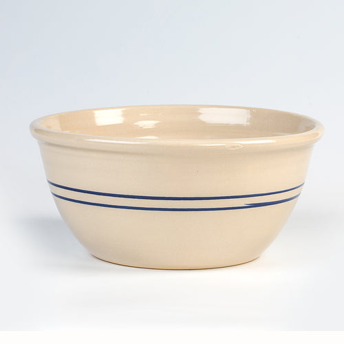 Handmade cream stoneware mixing bowl with two blue stripes, crafted in the USA, suitable for Kitchen & Food, Cookware, Baking Supplies, and Holiday Hosting collections.
