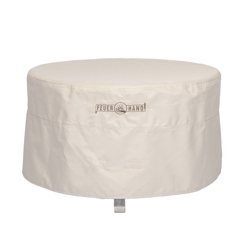 Beige weather-resistant ripstop fabric cover for outdoor fire bowls with full-length zipper and hook, suitable for camping and farm use, featured in lamps and lighting collections.