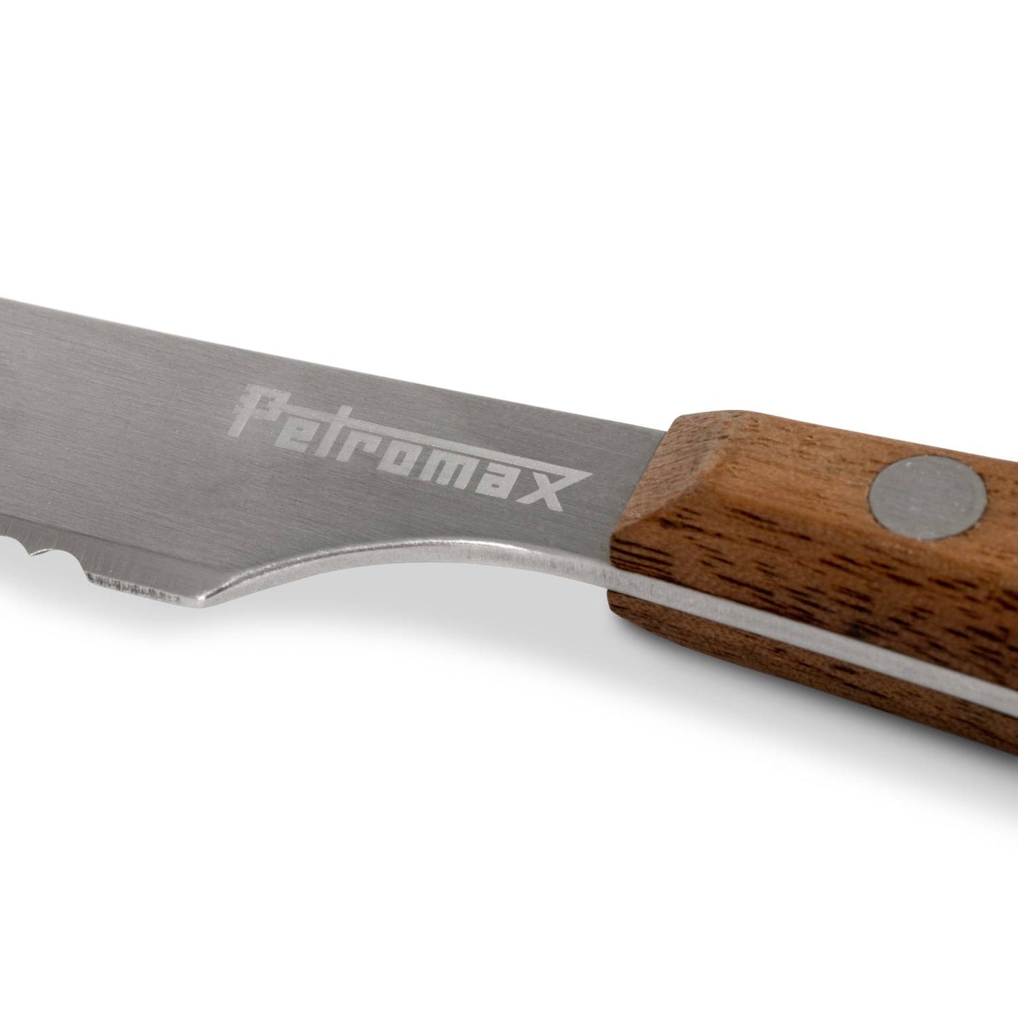 Close-up of a serrated stainless steel knife blade with engraved brand name and a sturdy wooden handle, designed for durable use in camping and outdoor dining collections.