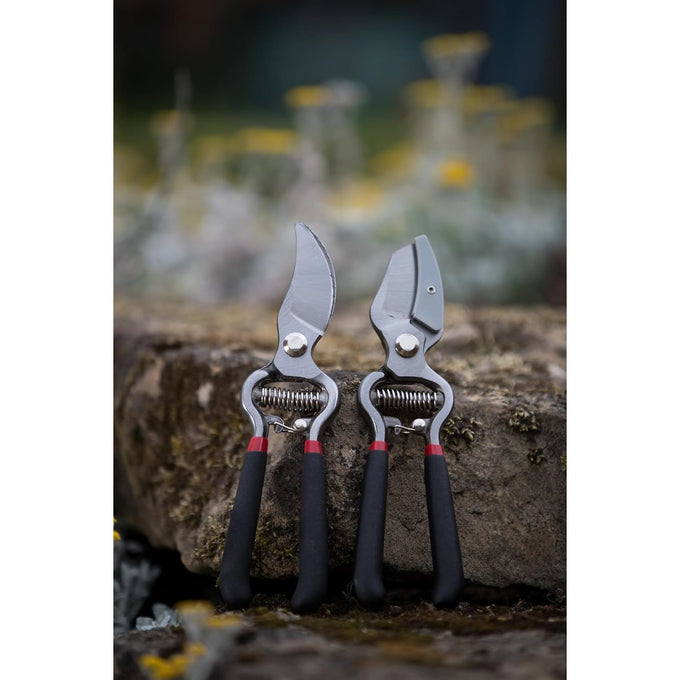Pair of drop-forged pruning shears with black ergonomic handles and stainless steel blades, designed for versatile garden cutting tasks in Farm, Garden & Tool and Lawncare collections.