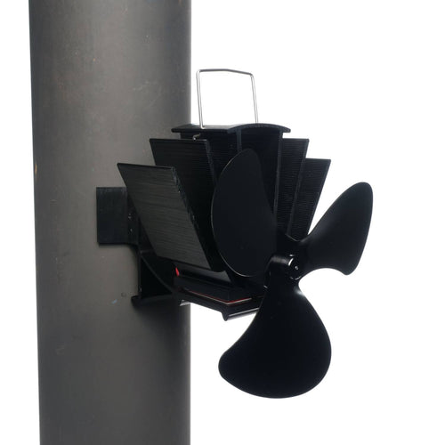 Black heat-activated fan with three broad blades and metal heat fins mounted on a vertical stove flue pipe, designed to circulate warm air efficiently in Stoves, Hearth Accessories, Best Sellers, Promo Eligible, and All Stoves & Appliances collections.