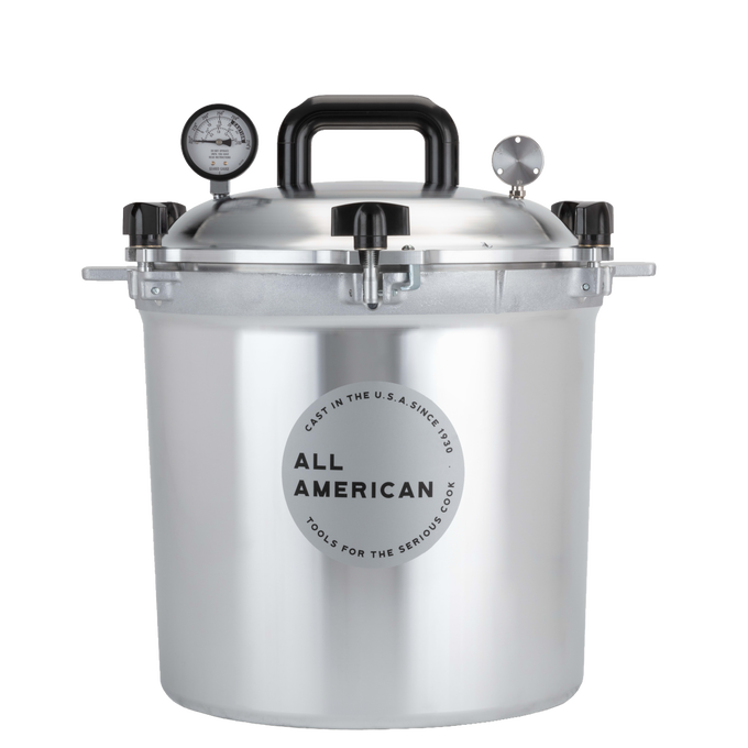 Heavy-duty pressure canner made in USA with durable aluminum construction, pressure gauge, and safety valve, ideal for kitchen food preservation and canning collections.