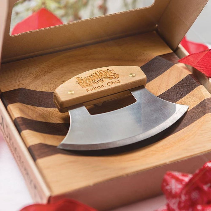 Handcrafted ulu knife with engraved wooden handle resting on a striped wooden bowl, ideal for kitchen food prep, knives, chopping, and cutting tasks in Farm, Garden & Tool and Kitchen Accessories collections.