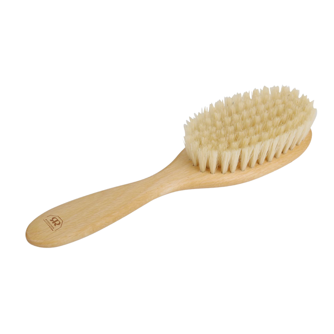 Handcrafted children's hairbrush with ultra-soft goat hair bristles and smooth wooden handle, designed to gently care for sensitive scalps, featured in Health & Wellness, Grooming and Personal Hygiene, Best Sellers, and Promo Eligible collections.