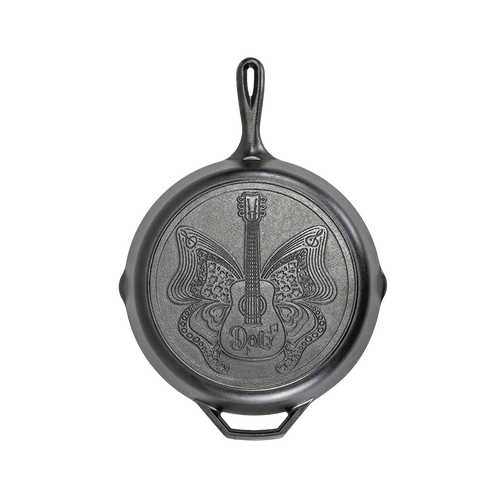 12-inch cast iron skillet featuring a butterfly and guitar design inspired by Dolly Parton, handcrafted in the USA, ideal for Kitchen & Food, Cookware, Cast Iron, Best Sellers, and Promo Eligible collections.