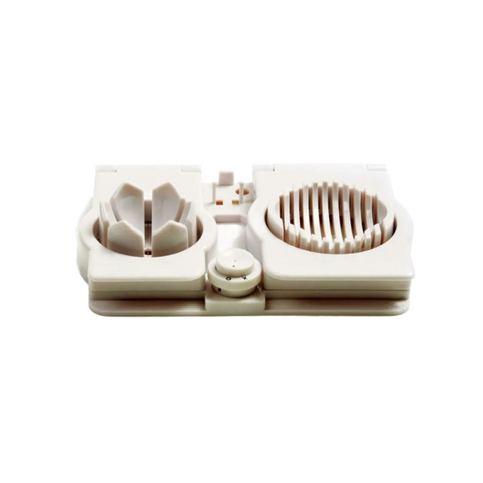 Compact plastic kitchen gadget with dual slicing compartments designed for creating uniform egg slices and wedges, featured in Kitchen & Food and Food Prep collections.