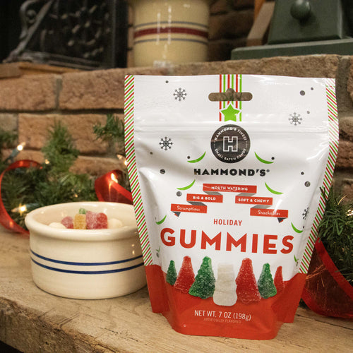 Two 7-oz bags of handcrafted, USA-made Christmas gummies shaped like festive trees and snowmen with red, green, and white sugar coating, perfect for snacks and holiday treats in Kitchen & Food, Candy, and Best Sellers collections.