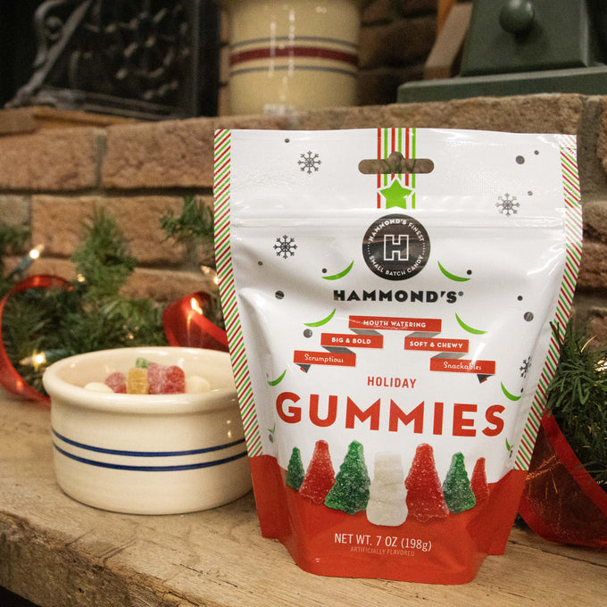 Two 7-oz bags of handcrafted, USA-made Christmas gummies shaped like festive trees and snowmen with red, green, and white sugar coating, perfect for snacks and holiday treats in Kitchen & Food, Candy, and Best Sellers collections.