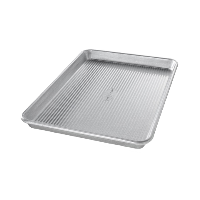 Aluminized steel jelly roll pan with ridged surface for even baking and roasting, handcrafted and made in USA, featured in Kitchen & Food, Cookware, and Baking Supplies collections.