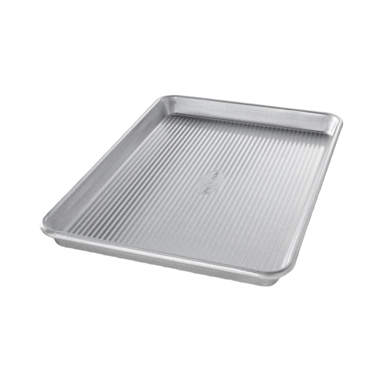 Aluminized steel jelly roll pan with ridged surface for even baking and roasting, handcrafted and made in USA, featured in Kitchen & Food, Cookware, and Baking Supplies collections.