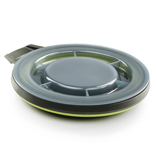 Collapsible bowl with a secure screw-on lid in muted colors, designed for easy transport and use in camping, farm, garden, and tool collections.
