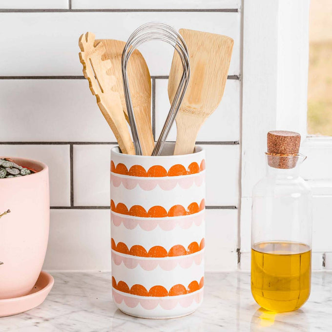 Ceramic utensil holder with orange scallop pattern containing wooden cooking tools and a stainless steel multi-function whisk, perfect for Kitchen & Food, Kitchen Gadgets, Cooking and Baking Helpers, Best Sellers, Promo Eligible collections.