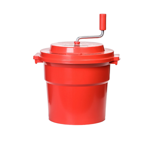 Bright red hand-powered spinner with a crank handle and secure lid, designed for fast clothes wringing and dual use in laundry and home decor collections.