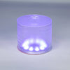 Inflatable rechargeable solar LED lantern glowing softly in purple, designed for versatile outdoor use in camping, emergency supplies, and garden lighting collections.