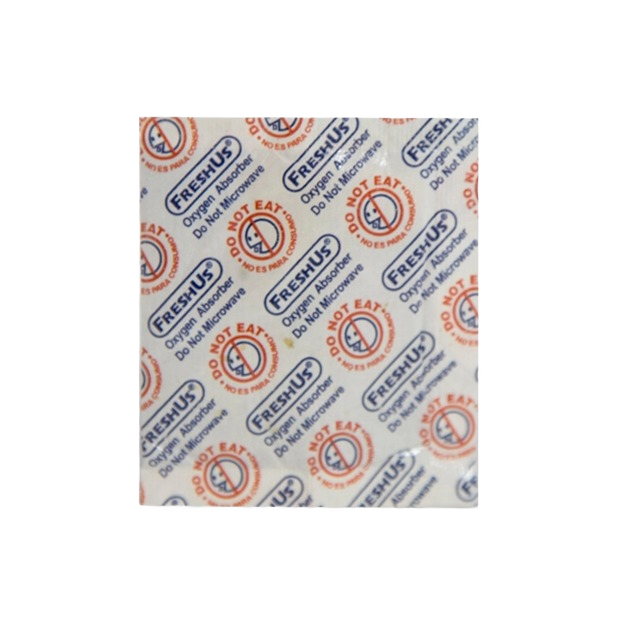 Small oxygen absorber packet labeled with warnings against eating and microwaving, used for food preservation in farm, kitchen, and emergency supplies collections.