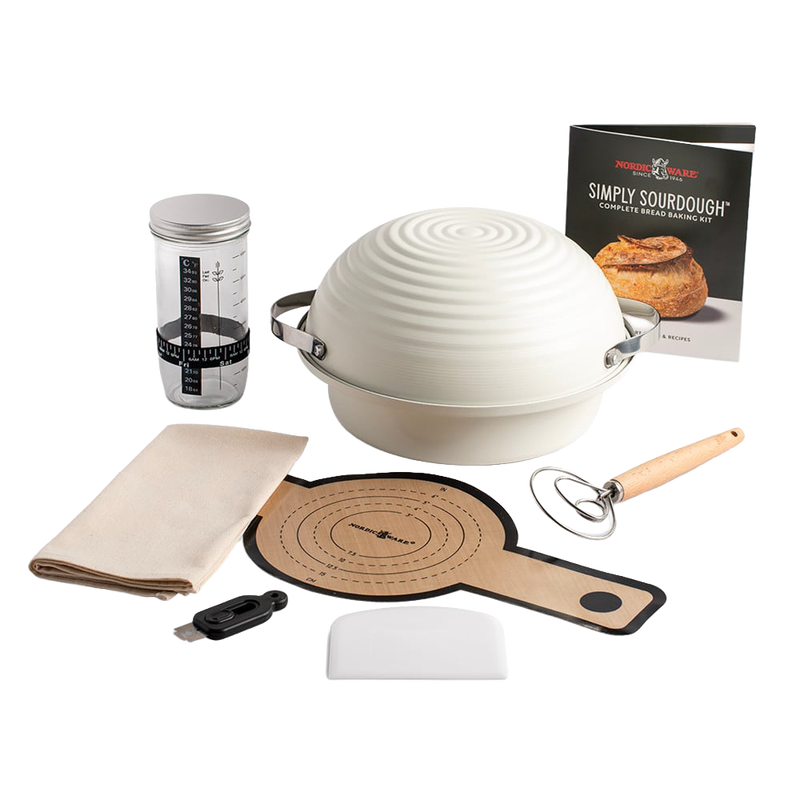 Complete sourdough bread making set with ceramic proofing bowl, dough scraper, wooden-handled whisk, measuring container, linen cloth, and recipe booklet, ideal for Kitchen & Food and Baking Supplies collections.