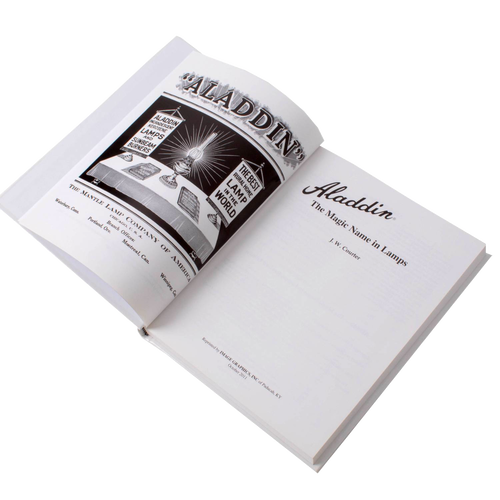 Open hardcover book titled "Aladdin: The Magic Name in Lamps" featuring black and white historic photos and illustrations, ideal for Toys, Books & Games and Heritage and Lifestyle Books collections.