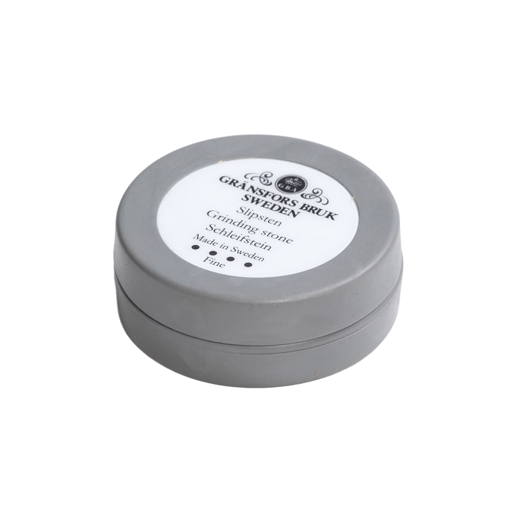 Compact round ceramic grinding stone in a gray container, handcrafted in Sweden, suitable for Farm, Garden & Tool, Knives & Axes, Accessories & Maintenance, and Best Sellers collections.