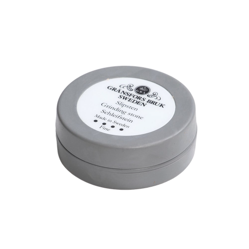 Compact round ceramic grinding stone in a gray container, handcrafted in Sweden, suitable for Farm, Garden & Tool, Knives & Axes, Accessories & Maintenance, and Best Sellers collections.