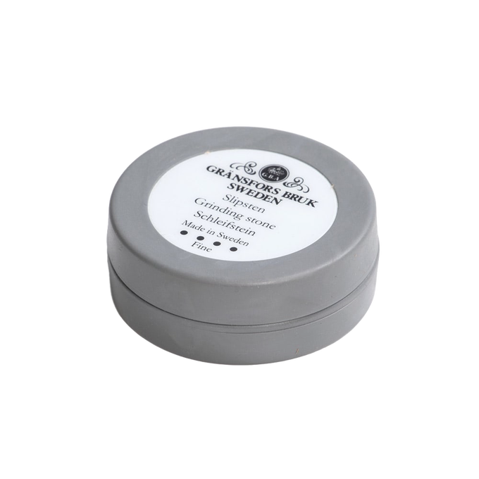 Compact round ceramic grinding stone in a gray container, handcrafted in Sweden, suitable for Farm, Garden & Tool, Knives & Axes, Accessories & Maintenance, and Best Sellers collections.