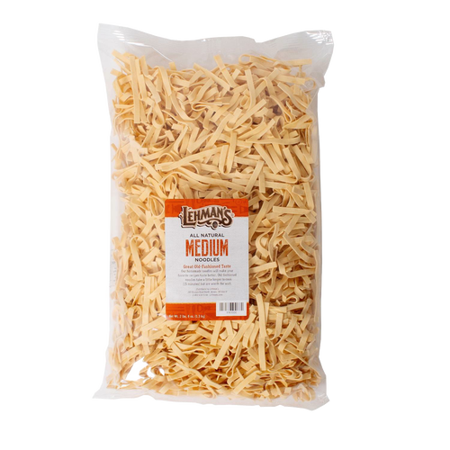 Clear plastic bag filled with handcrafted medium-width all-natural egg noodles, made in USA, ideal for Kitchen & Food, Pantry, Food, USA Made, Best Sellers, and Promo Eligible collections.
