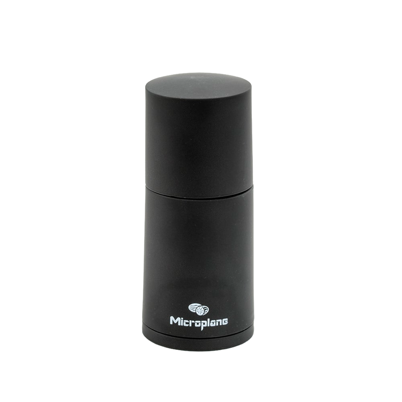 Matte black compact spice grinder for fresh cinnamon and nutmeg, featuring sturdy blades and a sleek design, ideal for Kitchen & Food, Brewing Coffee and Tea, and Best Sellers collections.