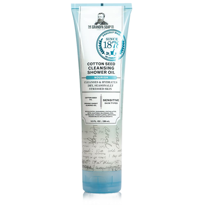 Tube of cotton seed cleansing shower oil with calming cotton and almond scent, made in USA, ideal for sensitive skin care in Health & Wellness and Grooming collections.