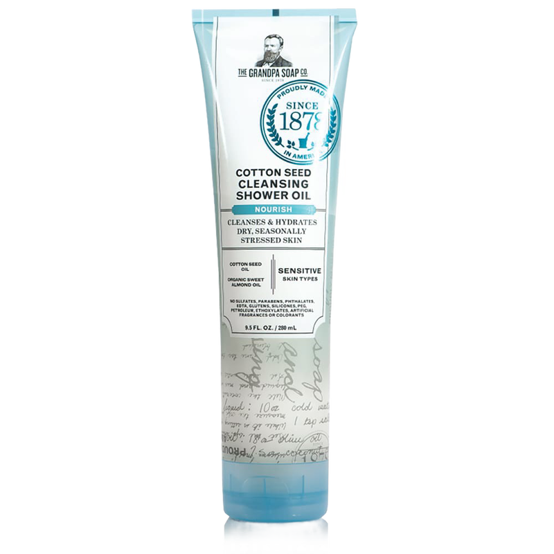 Tube of cotton seed cleansing shower oil with calming cotton and almond scent, made in USA, ideal for sensitive skin care in Health & Wellness and Grooming collections.