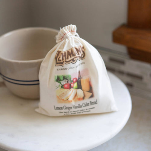 Natural fabric drawstring bag containing handcrafted lemon ginger vanilla cider bread mix with rustic packaging, ideal for Kitchen & Food, Pantry, Dry Goods and Mixes, Best Sellers, Promo Eligible collections.
