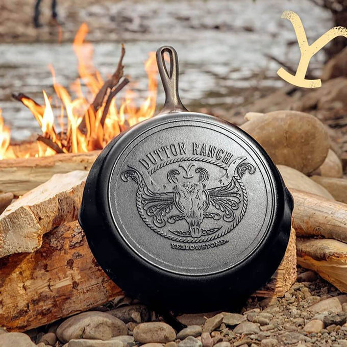 Handcrafted cast iron skillet featuring an embossed steer skull and rope emblem, made in USA, ideal for Kitchen & Food, Cookware, Cast Iron, USA Made, Best Sellers, and Promo Eligible collections.