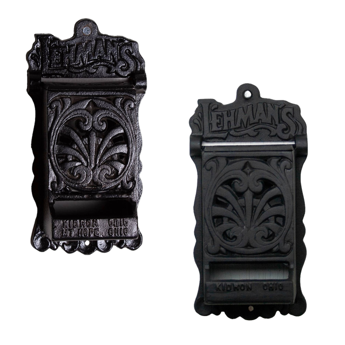 Pair of handcrafted black cast iron wall-mounted match holders with vintage design and detailed scrollwork, made in USA, ideal for Home & Decor and Best Sellers collections.