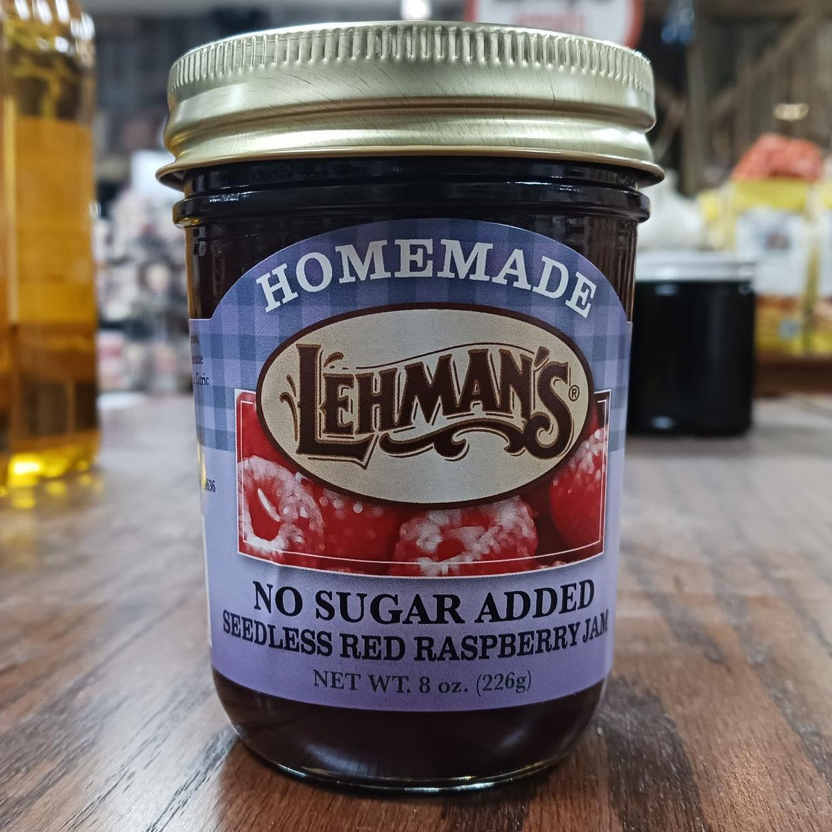 Handcrafted jar of Lehman's no sugar added seedless red raspberry jam made with all-natural ingredients, perfect for Kitchen & Food, Food, and Best Sellers collections.