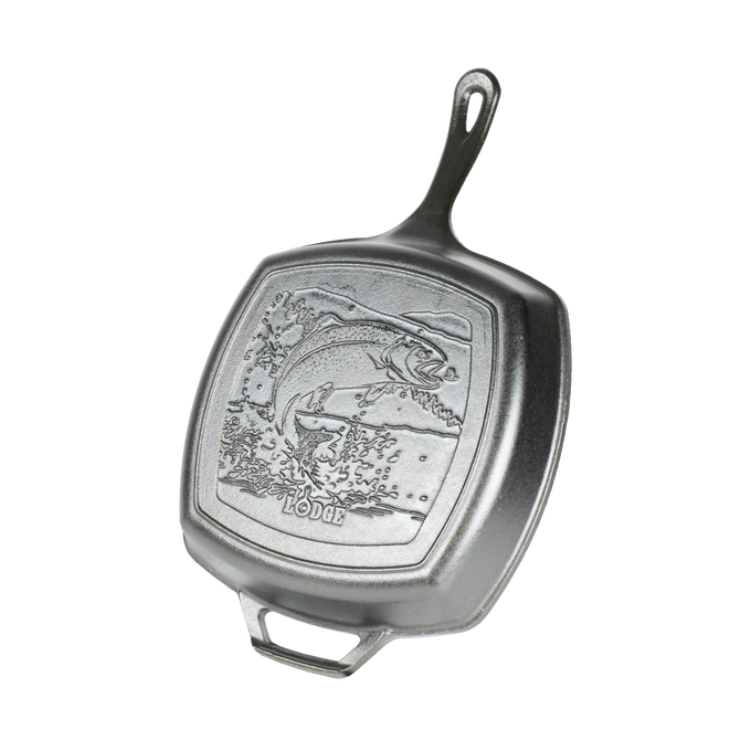 Square cast iron grill pan with a raised jumping trout design, featuring a long handle and helper grip, handcrafted and made in USA, ideal for Kitchen & Food, Cast Iron, Grilling, and Best Sellers collections.