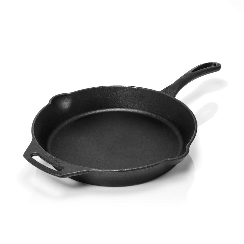 Heavy-duty cast iron skillet with a long handle and helper grip, featuring a smooth cooking surface ideal for Farm, Garden & Tool, Kitchen & Food, Camping, Cookware, Cast Iron, Best Sellers, and Promo Eligible collections.