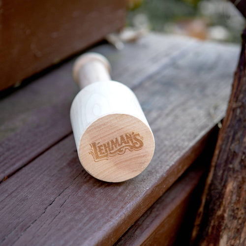 Close-up of handcrafted birch mallet with engraved logo, a durable Amish made tool included in wood splitting and hauling collections, highlighting quality USA craftsmanship.