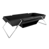 Portable black steel fire bowl with angled legs and attached baking compartment for outdoor cooking, featured in Farm, Garden & Tool, Camping, and Best Sellers collections.