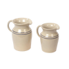 Set of two handcrafted glazed stoneware pitchers in cream with subtle blue stripes, ideal for serving beverages or as decorative vases, featured in Kitchen & Food and USA Made collections.