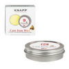 Tin of KNAPP Cast Iron Wax for Seasoning with beeswax blend in a metal container alongside its branded white packaging, suitable for Kitchen & Food, Cookware, Cast Iron, and USA Made collections.