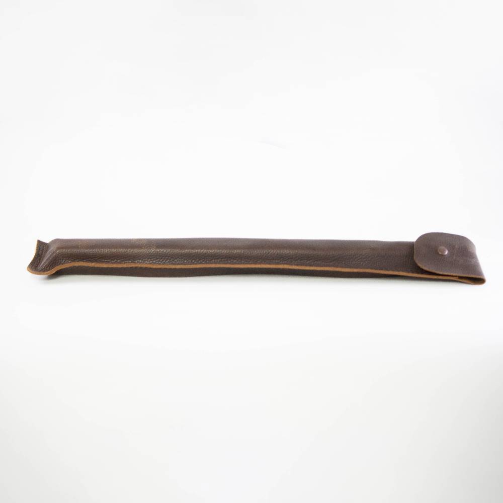 Handcrafted dark brown leather sheath with stitched edges and a button closure, designed to protect and carry woodcutting tools in farm, garden, and hauling collections.