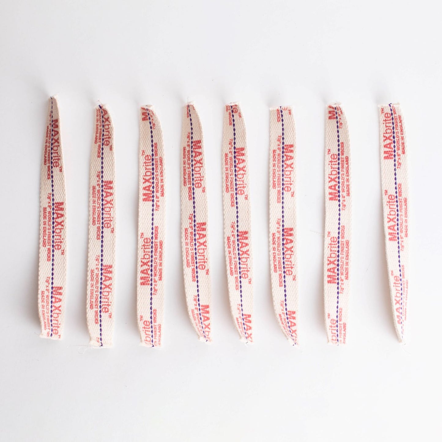 Set of handcrafted flat cotton wicks with red printed branding and a stitched center line, designed for clean fuel delivery in oil lamps, ideal for Farm, Garden & Tool, Lamps & Lighting, and Emergency Supplies collections.