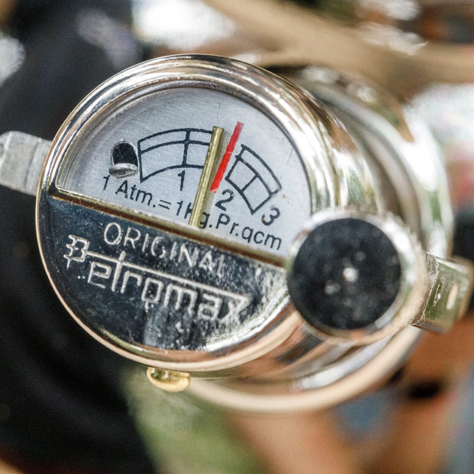 Close-up of a polished metal manometer gauge displaying pressure levels with a red indicator, designed for use in lamps, featured in Lamps & Lighting and Parts and Accessories collections.