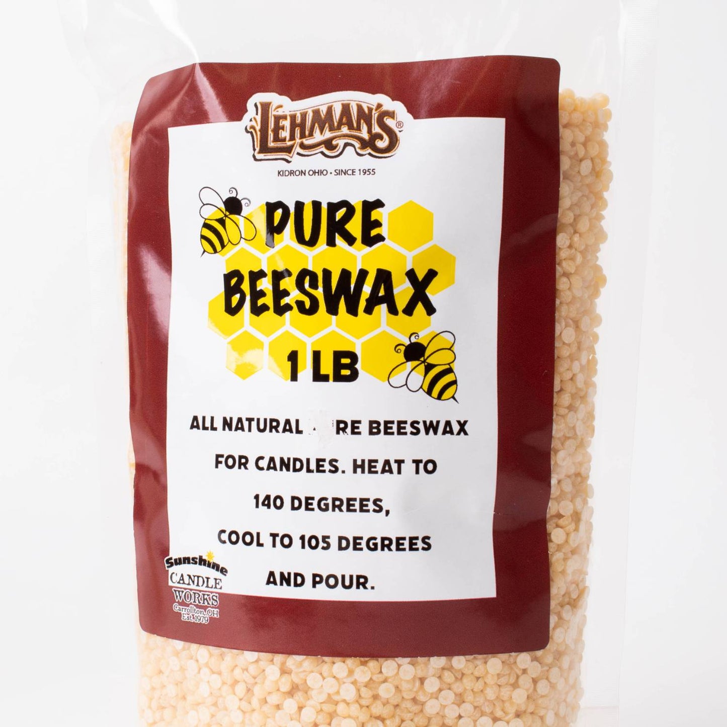 Clear plastic bag filled with light yellow beeswax pellets labeled for artisanal candle making, highlighting natural ingredients suitable for lamps and candlemaking supplies.