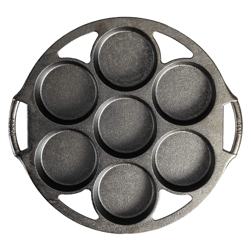 Round cast iron mini cake pan with seven cavities, featuring dual side handles for easy handling, made in USA, ideal for Kitchen & Food, Cast Iron, Baking Supplies, and Best Sellers collections.
