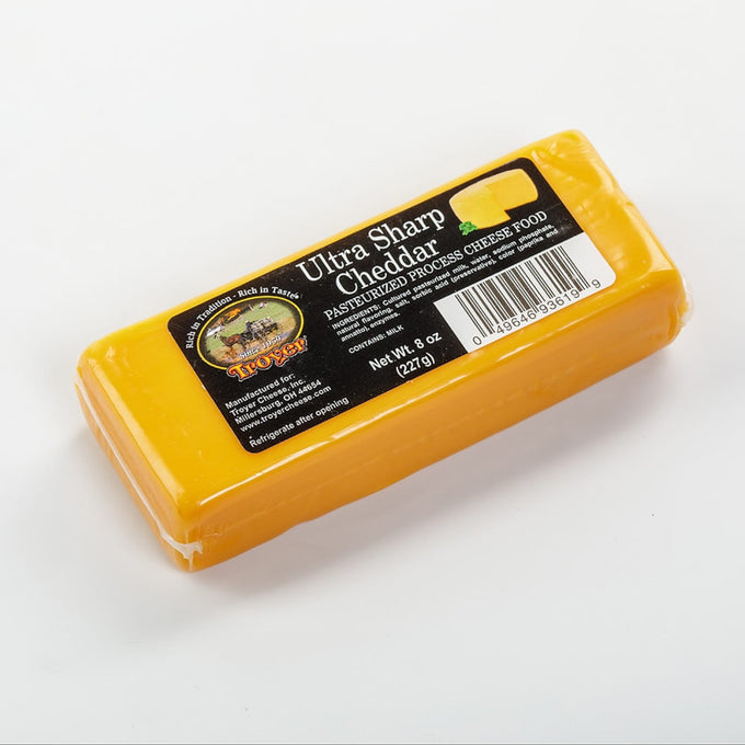 Handcrafted shelf-stable ultra sharp cheddar cheese food block in an 8-ounce package, made in USA, perfect for Kitchen & Food, Snacks and Sweets, Pantry, USA Made, Best Sellers, and Promo Eligible collections.