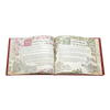 Open hardcover storybook with detailed illustrations and decorative text about Santa’s village and house, featured in Home & Decor, Toys, Books & Games, and Holiday Decor collections.