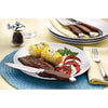 Set of four jumbo steak knives with forged stainless steel blades and polished rosewood handles, pictured cutting a medium-rare steak alongside corn and tomato salad, featured in Kitchen & Food and Knives & Axes collections.