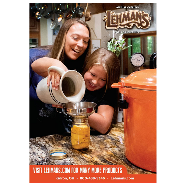 Mother and daughter filling a jar with liquid using a ceramic pitcher and funnel beside an orange canning pot, depicting a warm home and garden how-to moment in best sellers and books collections.