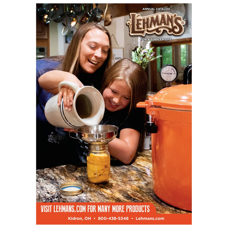 Mother and daughter filling a jar with liquid using a ceramic pitcher and funnel beside an orange canning pot, depicting a warm home and garden how-to moment in best sellers and books collections.